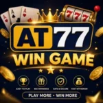 AT77 WIN GAME logo design featuring bold gold “AT77” text with casino style elements like crown, playing cards, slot machine, and coins on a dark blue background with glowing effects and gaming theme visuals.